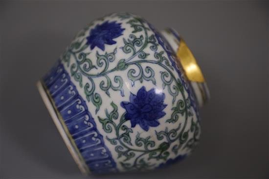 A rare Chinese doucai lotus flower jar, Wanli six character mark and probably of the period, (1573-1619), H. 9.5cm, D. 10.8cm, later